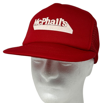 Front view of a red vintage trucker hat featuring McPhails Fuel logo in white