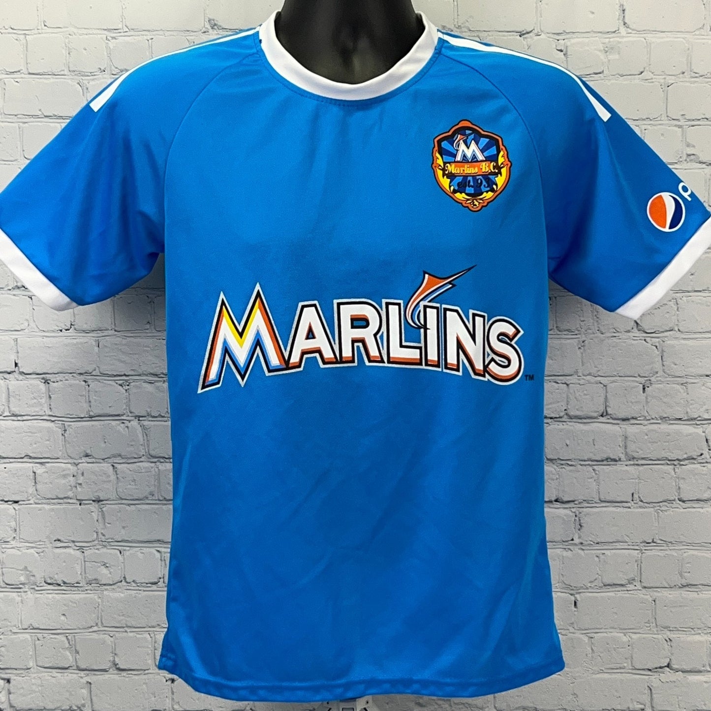 Miami Marlins Blue Jersey with Logo, Front View, Size Large, Featuring Pepsi Sponsor Emblem