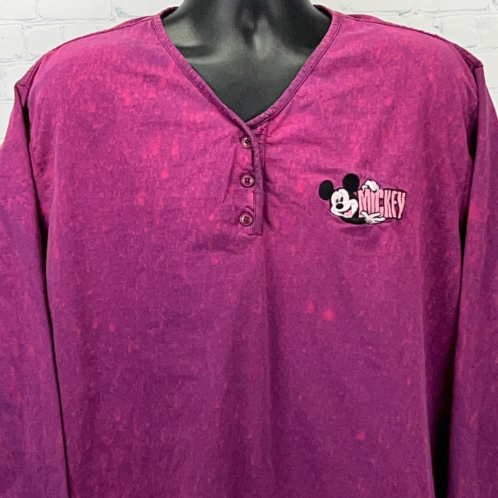 Mickey Mouse purple long sleeve shirt with button detail and chest logo design