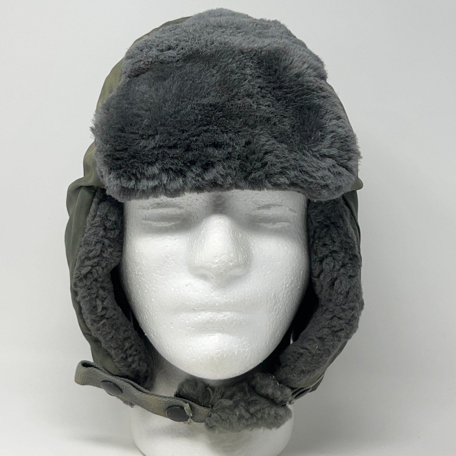 Vintage military helmet in gray with fur lining, front view