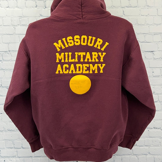 Maroon hoodie from The Cotton Exchange featuring the Missouri Military Academy logo on the back