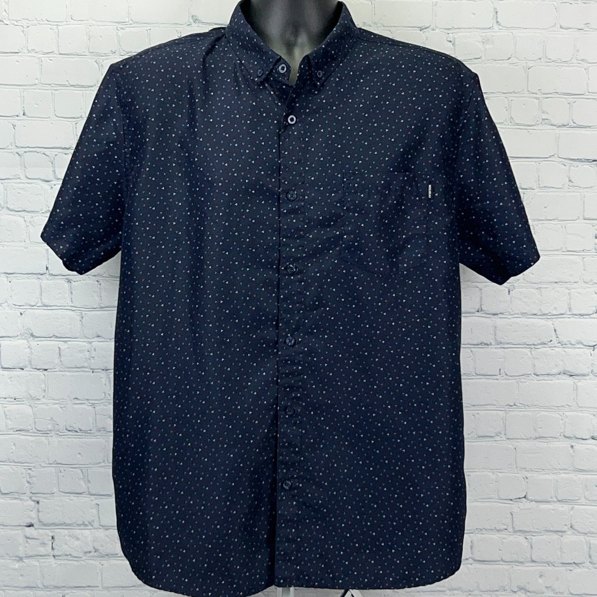 Molokai Surf Co navy short-sleeve button-up shirt with subtle pattern and chest pocket detail