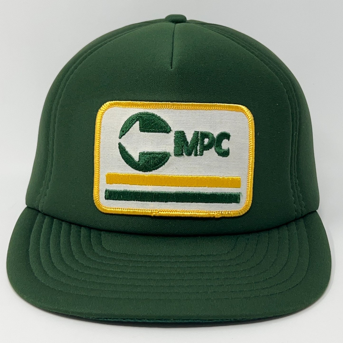 Vintage green cap with MPC logo and striped detail on front view, adjustable fit for all sizes.