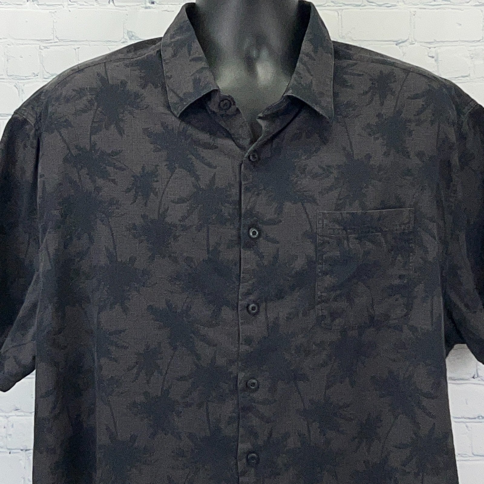 Nat Nast Short Sleeve Button-Up Shirt in Black with Floral Pattern and Chest Pocket