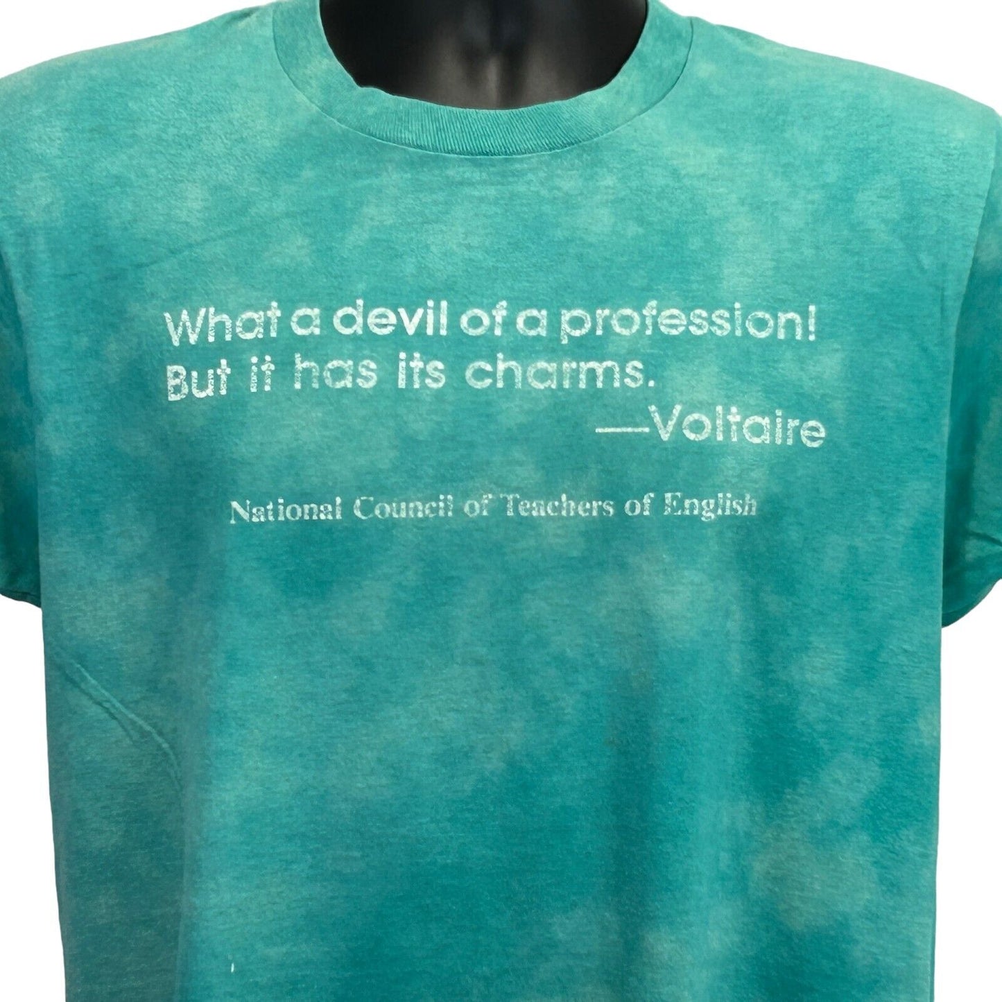 Front view of Screen Stars teal T-Shirt with Voltaire quote and National Council logo