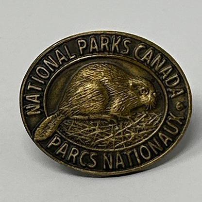 Bronze Canada Lapel Pin featuring a beaver and text National Parks Canada, detailed front view