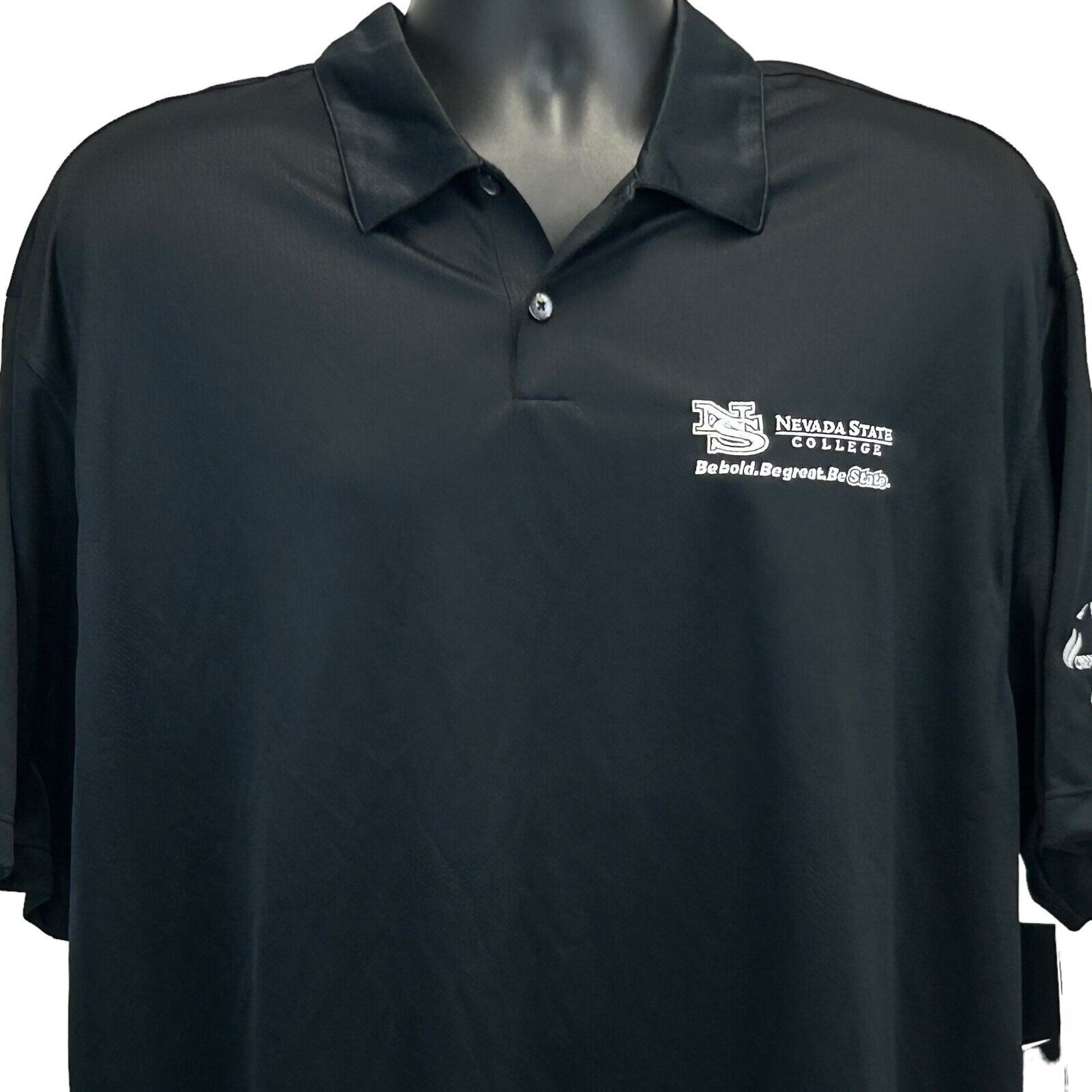 Nike black polo shirt with Nevada State College logo on the front, short sleeves, size medium