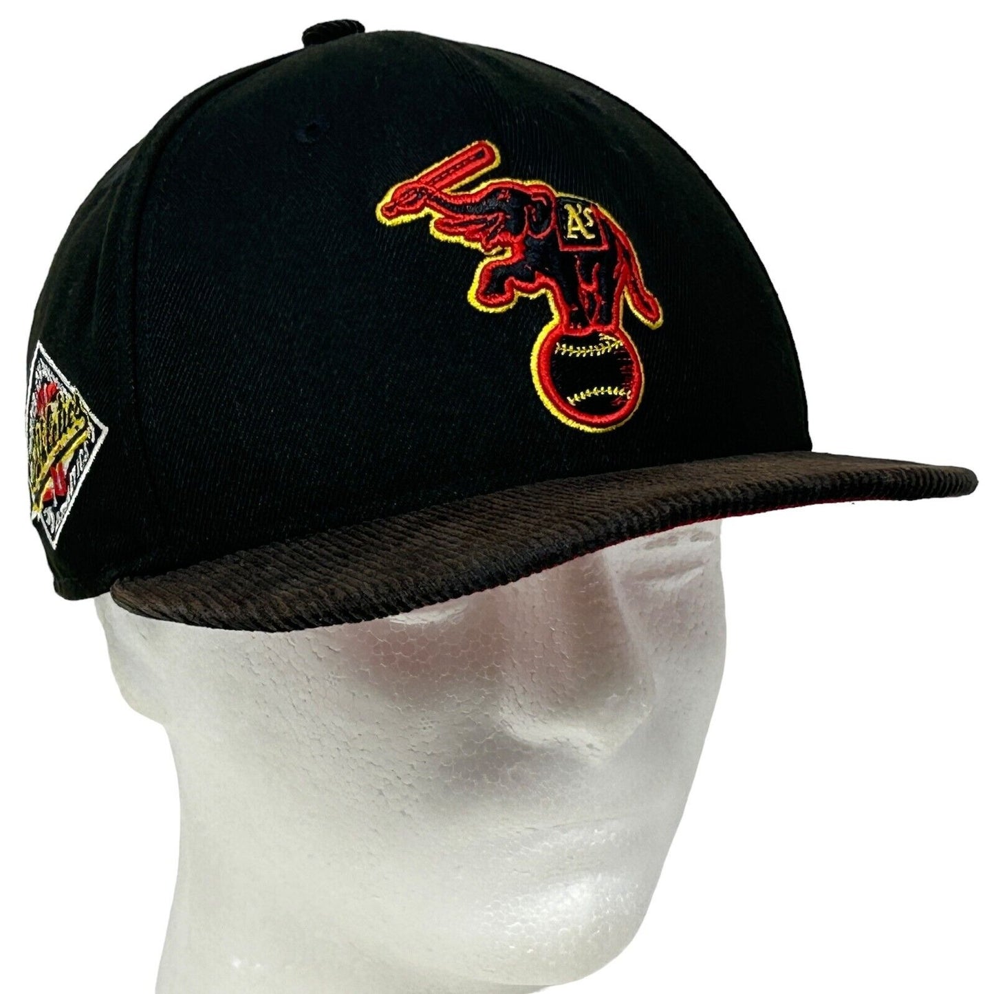 New Era Athletics black cap featuring elephant logo and baseball design, front view