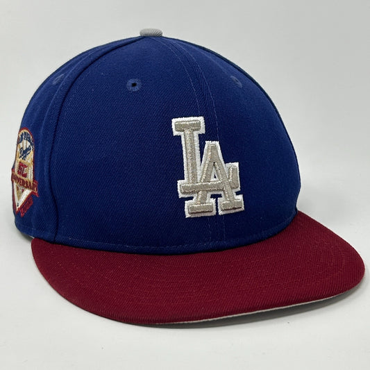Front view of a blue Los Angeles Dodgers Hat with a maroon brim and embroidered LA logo