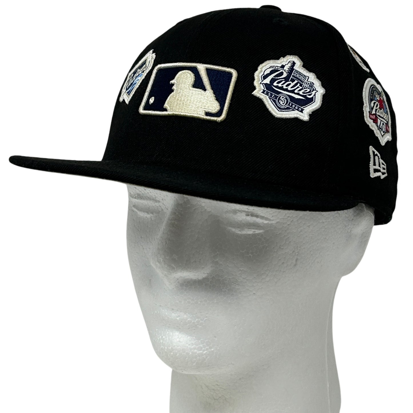 Black New Era San Diego Padres snapback hat with embroidered MLB logos and patches on the front