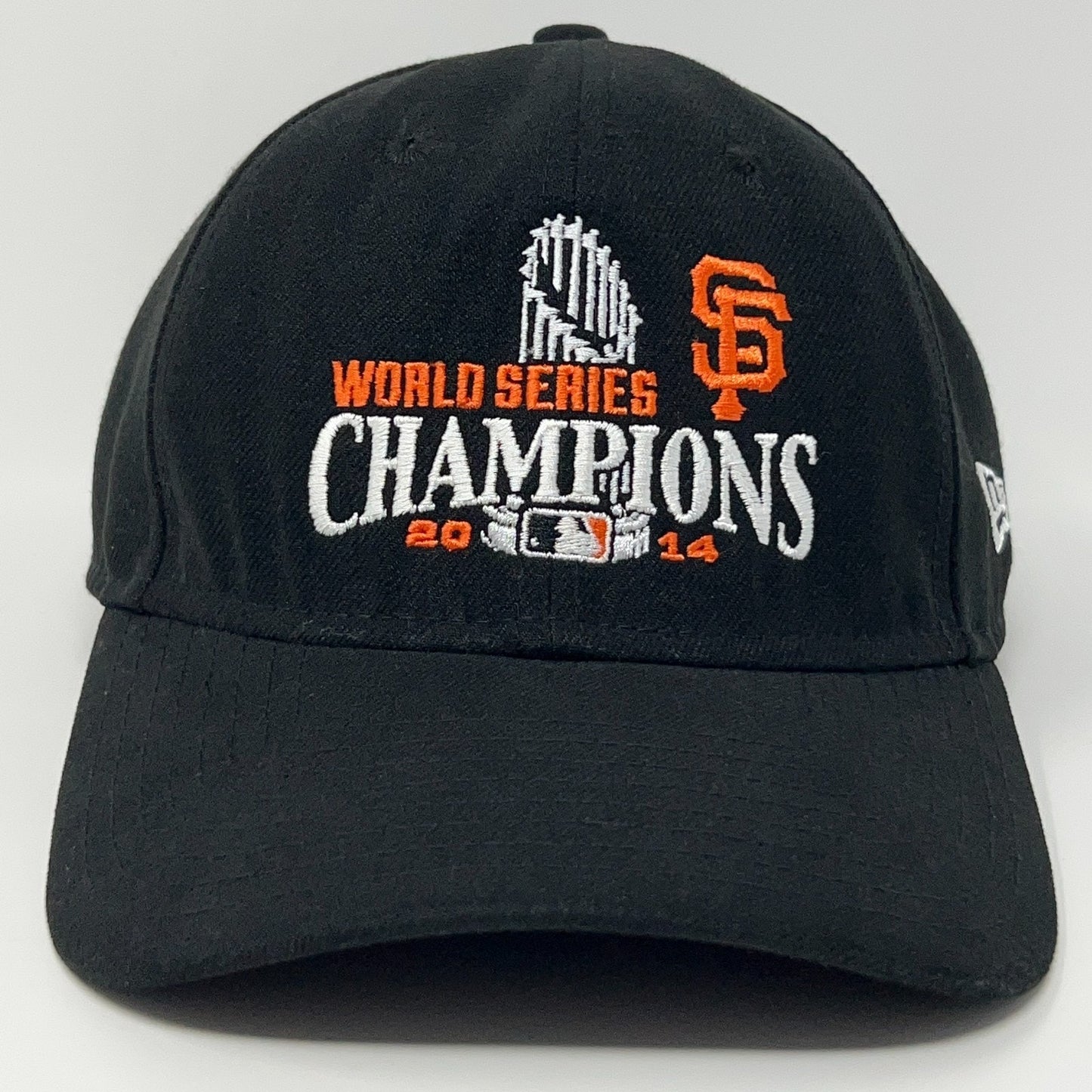 Black New Era cap featuring San Francisco Giants World Series Champions 2014 emblem on the front