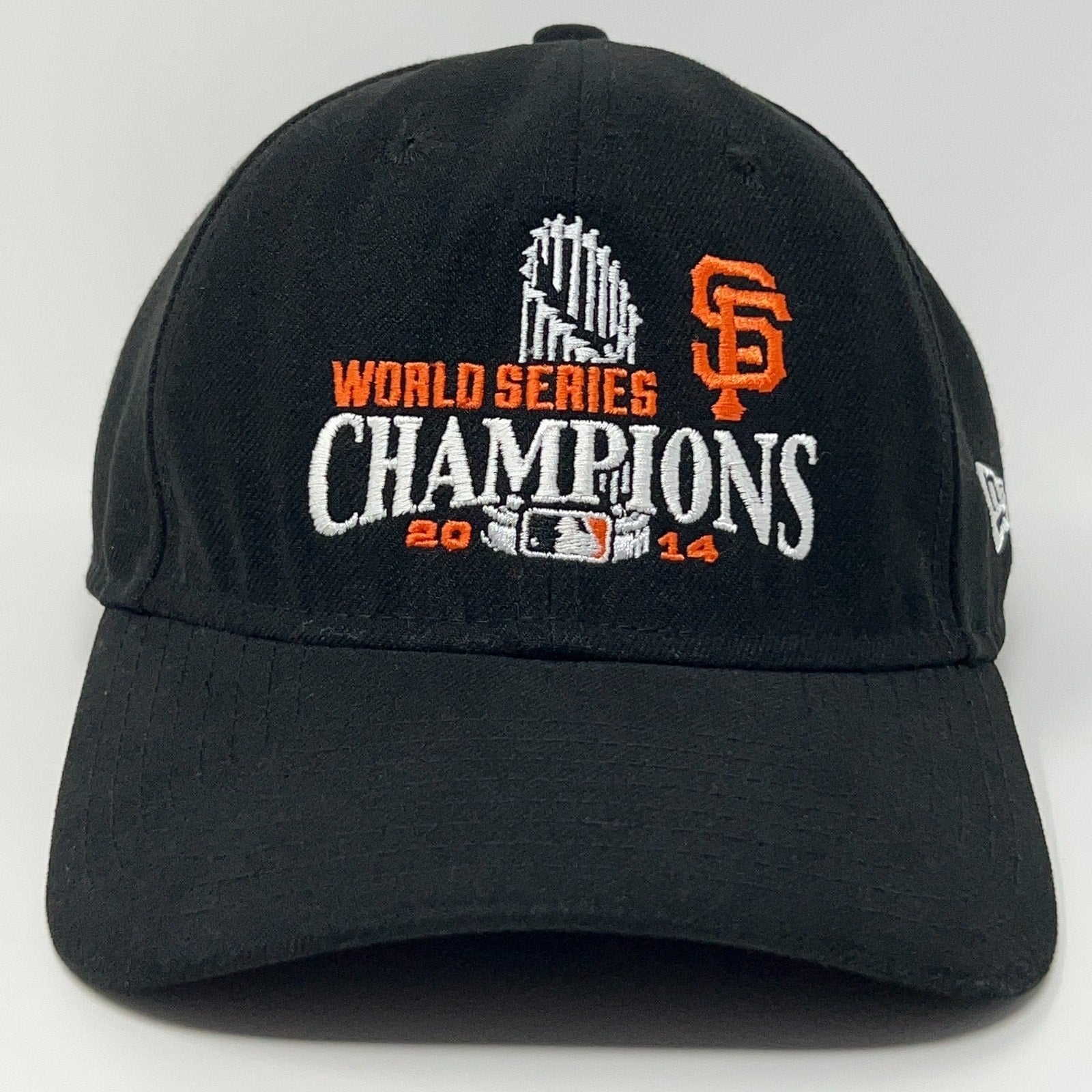 Black New Era cap featuring San Francisco Giants World Series Champions 2014 emblem on the front