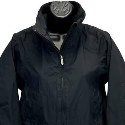 Nike black jacket close-up front view with zipper and subtle logo details