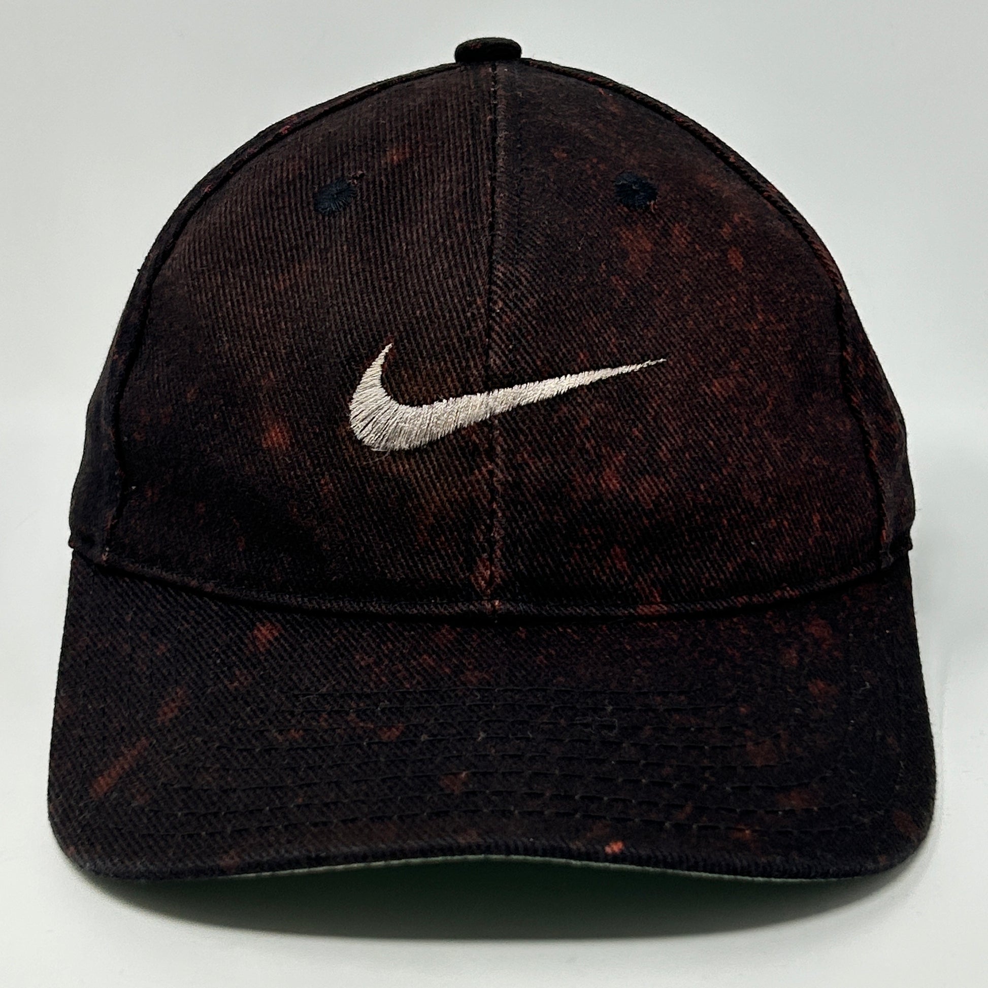 Nike Black Distressed Hat with White Swoosh Logo, Front View, Adjustable Fit