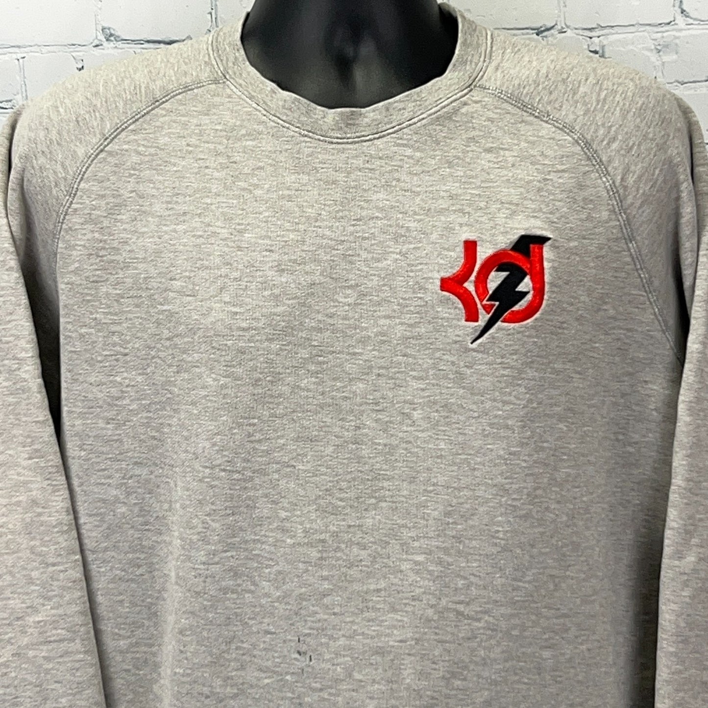 Gray Kevin Durant Nike Sweatshirt with front logo detail in red and black