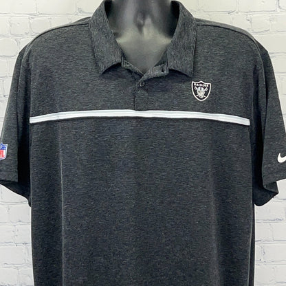 Nike men's black polo shirt featuring Las Vegas Raiders logo, front view with a striped design