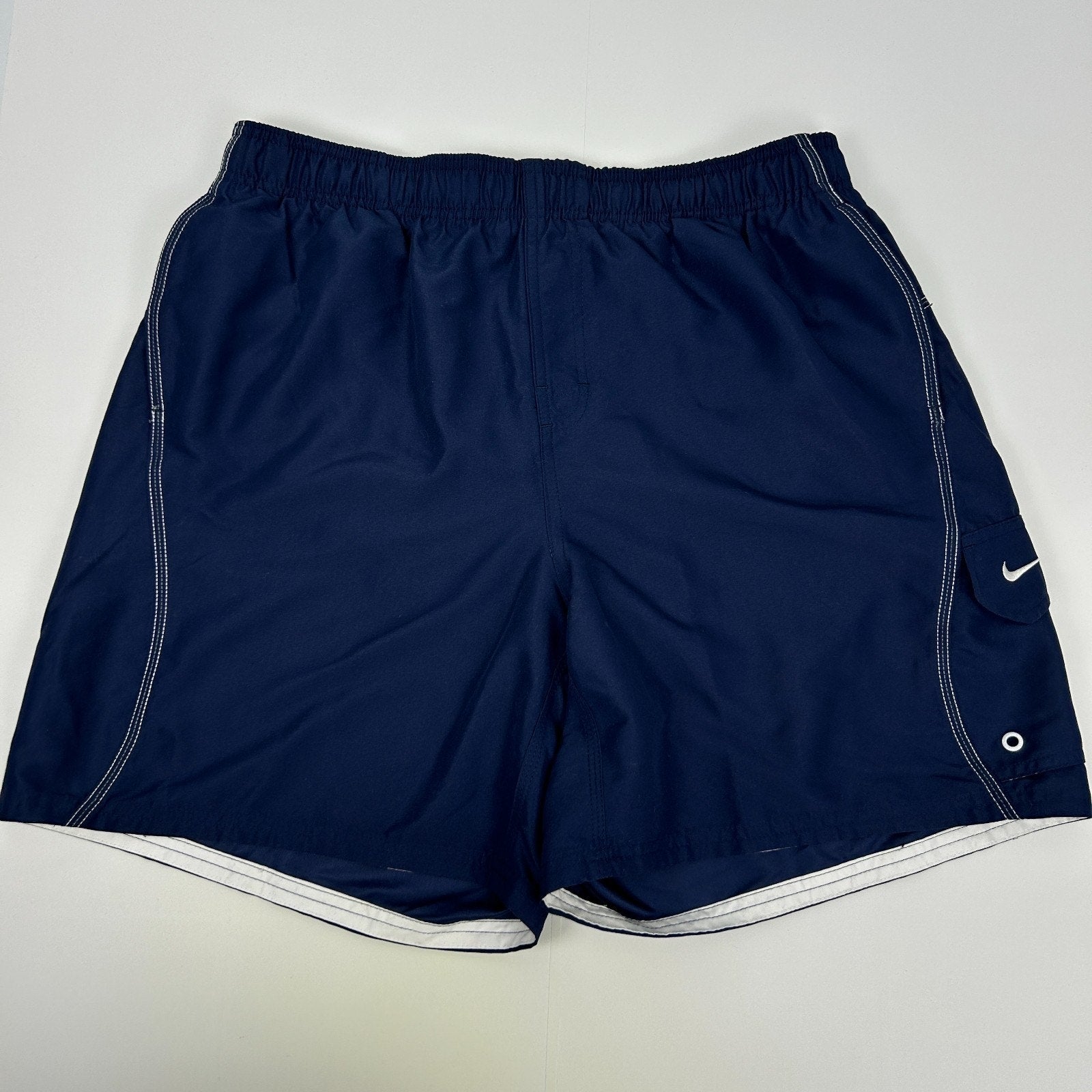 Navy Nike Shorts in size medium, shown from the back with white detailing and logo on the side