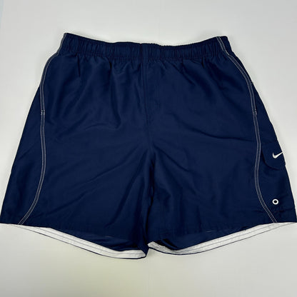 Navy Nike Shorts in size medium, shown from the back with white detailing and logo on the side