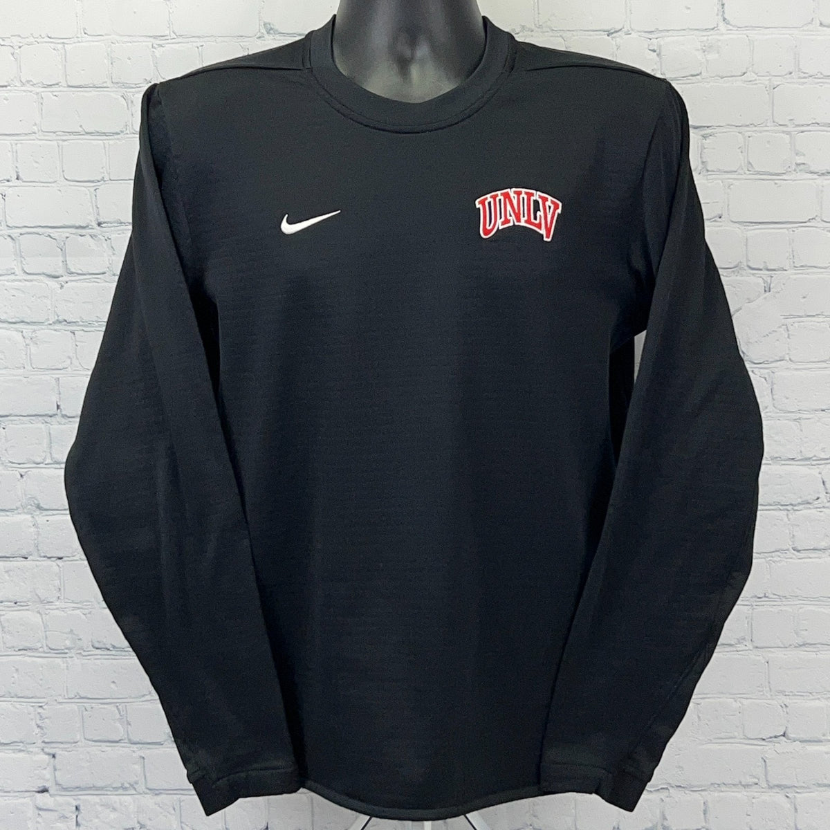 Black Nike long sleeve shirt featuring UNLV logo on the chest for comfortable wear