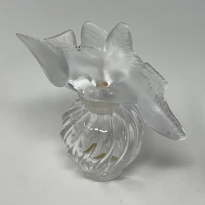 Nina Ricci floral glass perfume bottle with a frosted two doves top, viewed from above