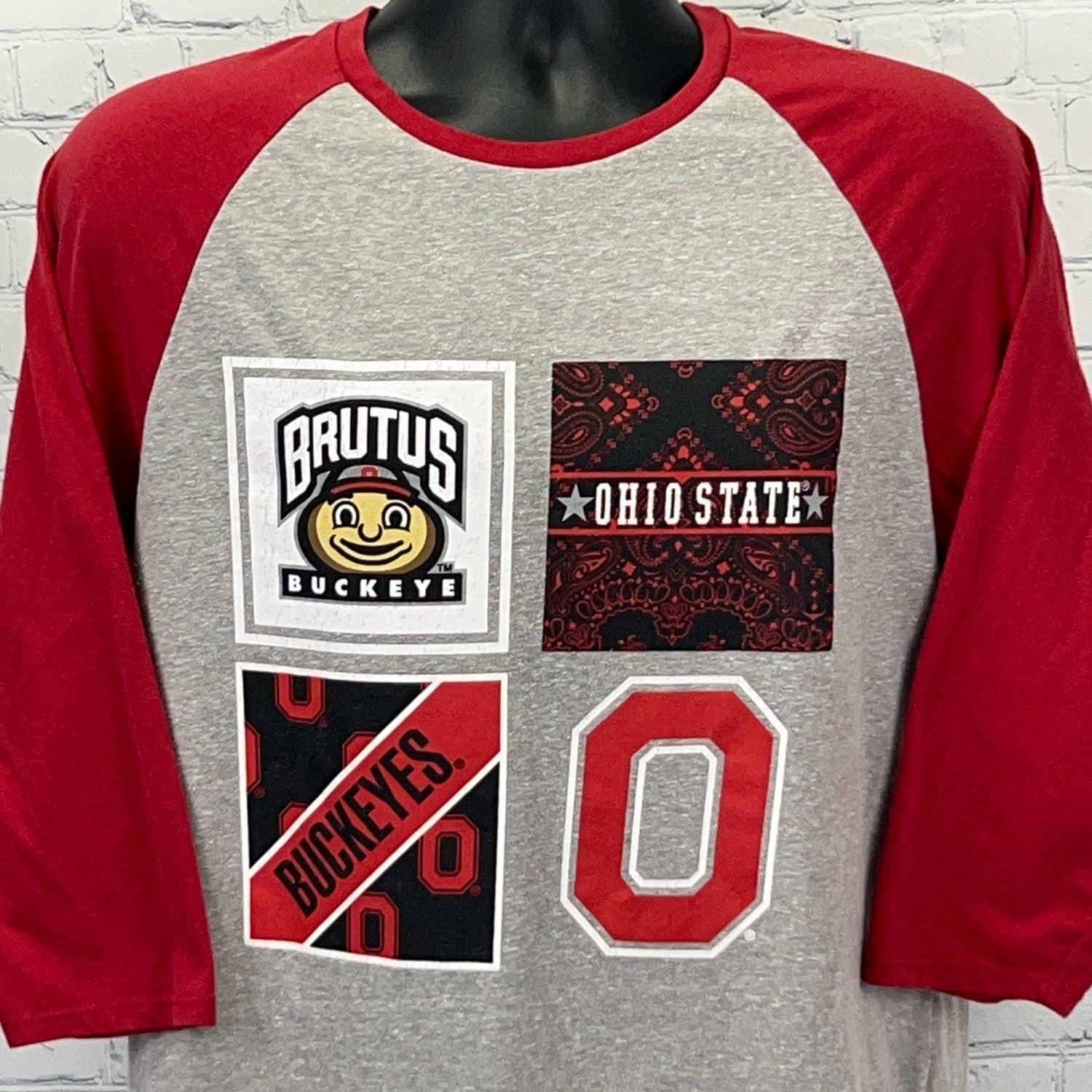 Ohio State Buckeyes gray and red baseball tee featuring Brutus logo and team graphics on the front.