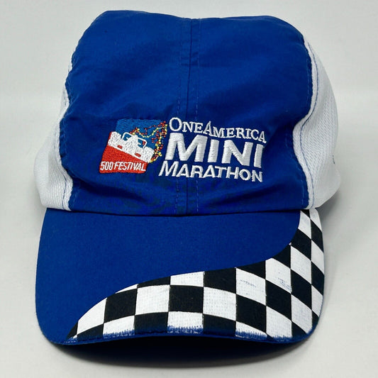 Front view of the blue One America 500 cap featuring a checkered pattern and festival logo
