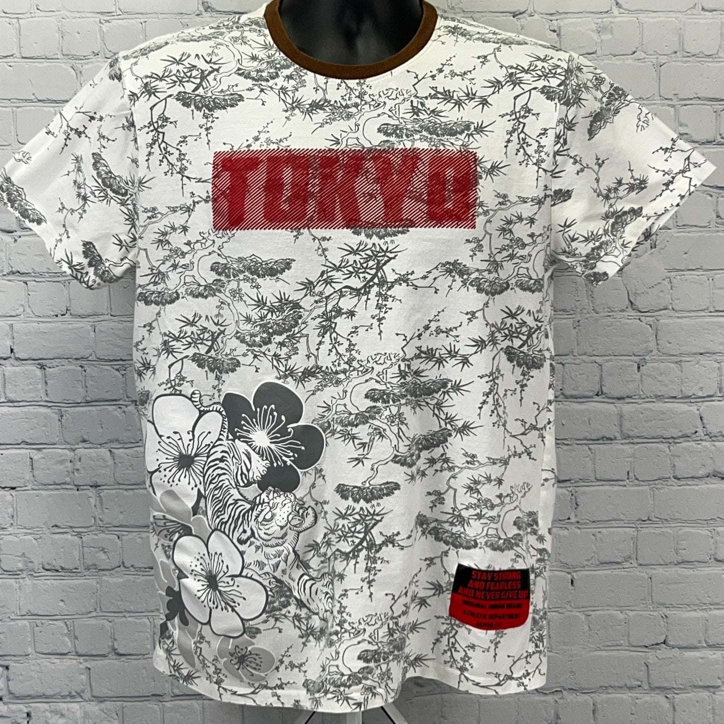 Original Gravity Tokyo white graphic t-shirt featuring floral prints and red Tokyo logo on front