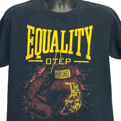Black T-Shirt featuring bold yellow 'EQUALITY Otep' design with boxing gloves on the front