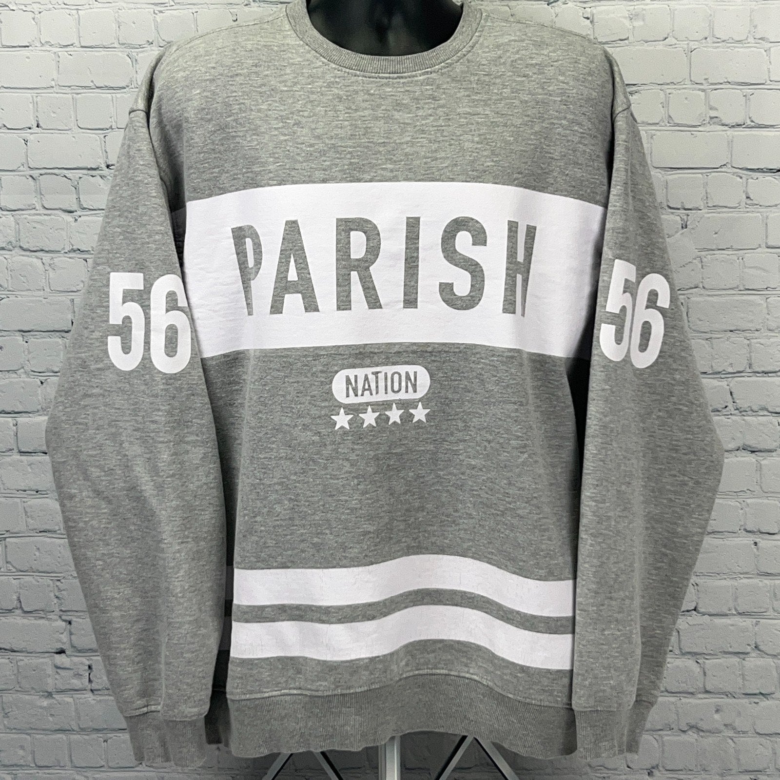 Gray Parish Nation sweatshirt with white stripes, front view, featuring a bold logo and number 56