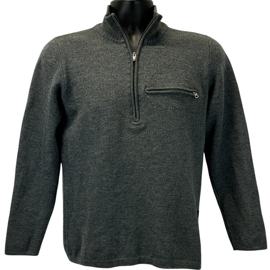 Patagonia gray pullover sweater in size medium with a zippered chest pocket and logo detail