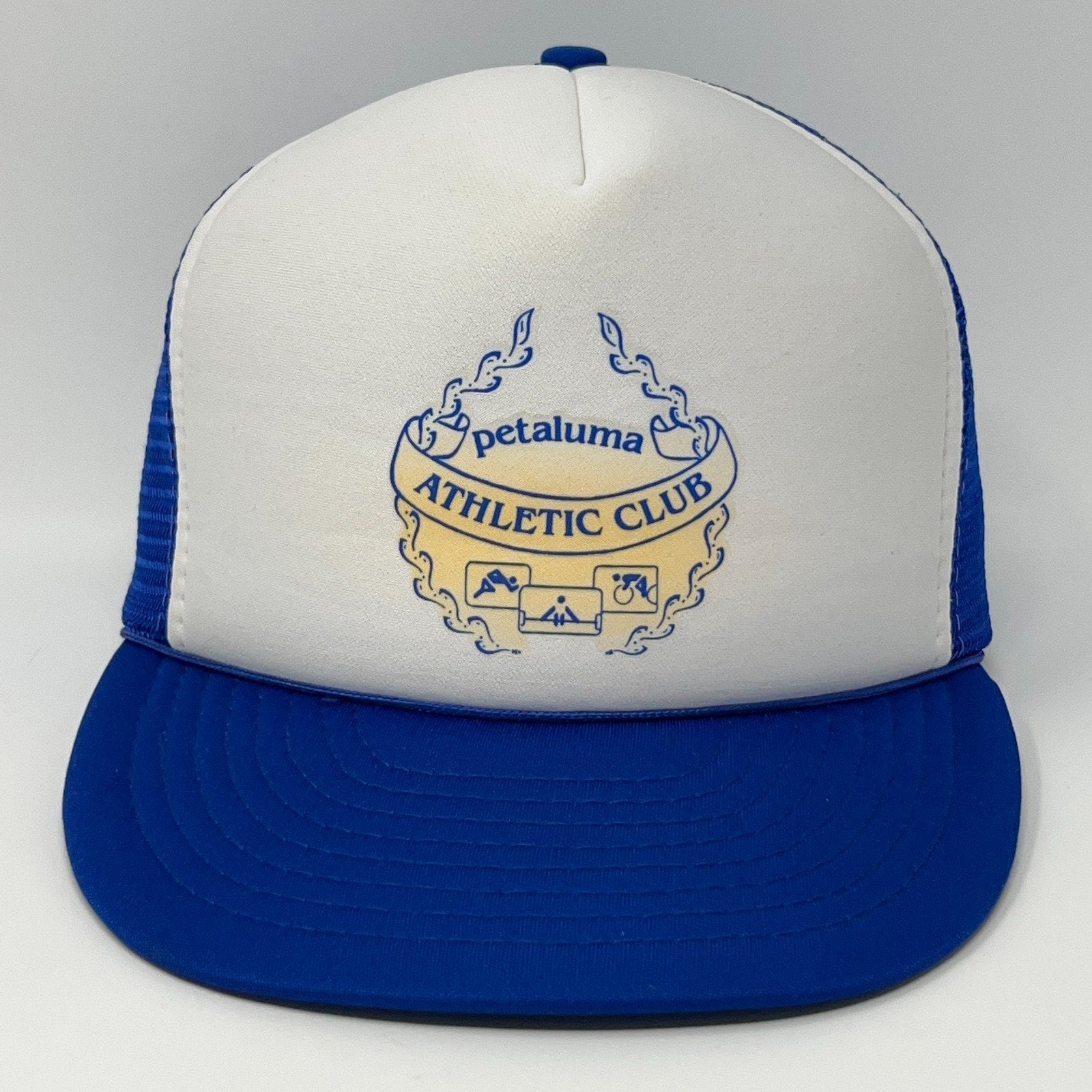 Vintage blue and white trucker cap hat with Petaluma Athletic Club logo on the front