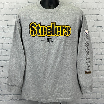 Gray long-sleeve Pittsburgh Steelers shirt featuring bold logo and NFL branding on the front
