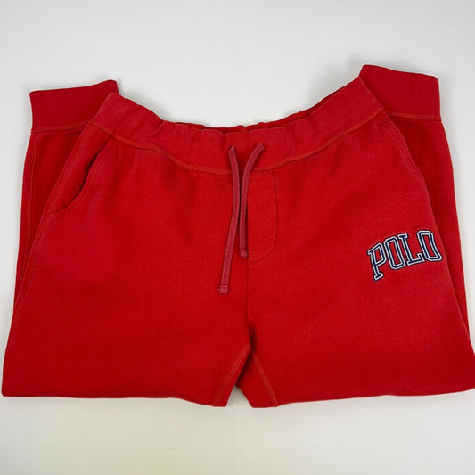 Front view of red Polo Ralph Lauren fleece sweatpants with embroidered logo and drawstring waist
