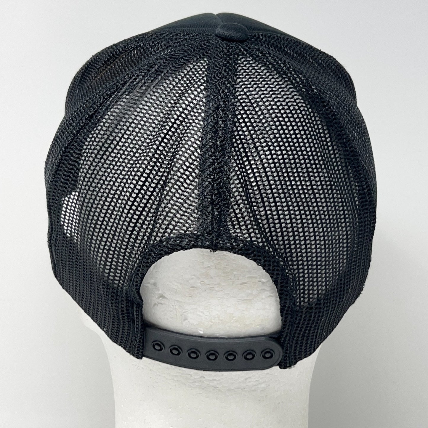 Vintage trucker cap hat in black, back view