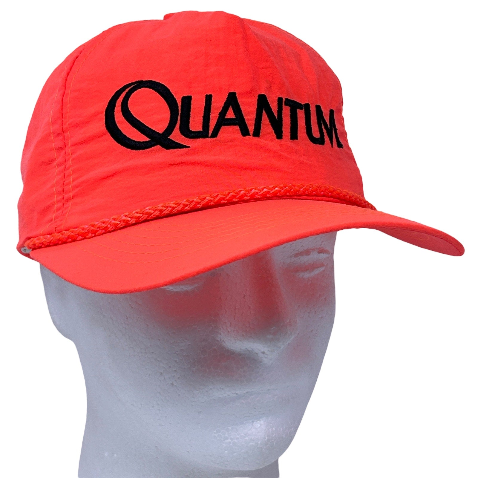 Vintage red hat featuring the Quantum Fishing Reels logo, front view with a comfortable fit