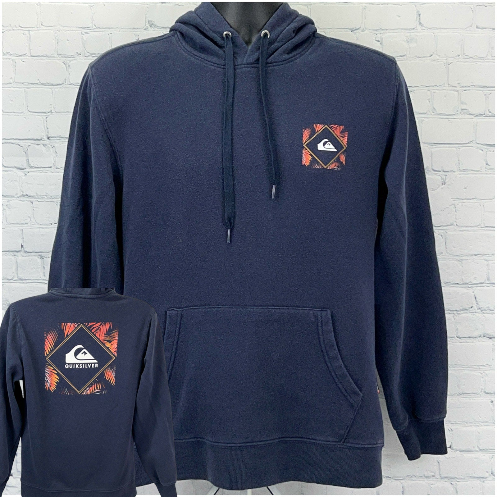 Quiksilver navy hoodie with front pocket and logo, featuring a geometric design on the back