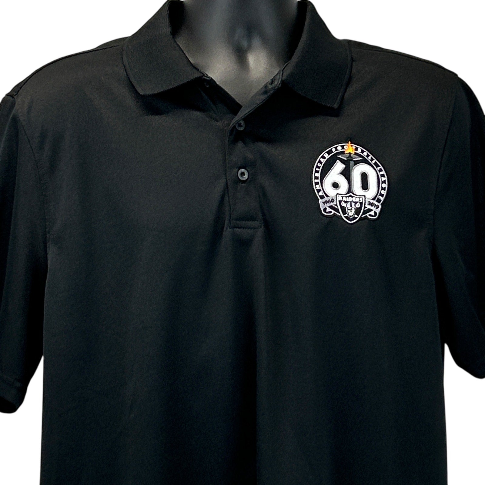 Black Raiders Polo shirt featuring a 60th anniversary logo on the left chest, front view