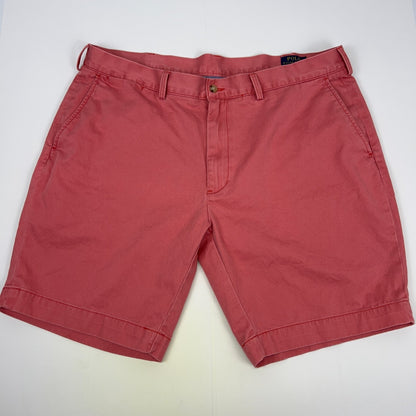 Ralph Lauren coral shorts in size 32 with front view and classic logo detailing