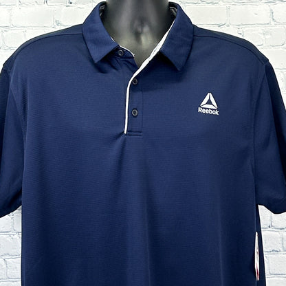 Reebok Polo in navy blue with a standard fit and logo on the chest, front view