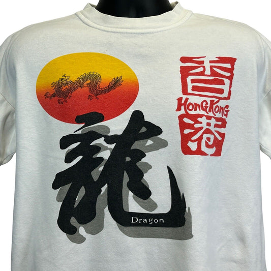 Vintage white T-shirt featuring Hong Kong Dragon graphic on the front in red and yellow colors, size medium