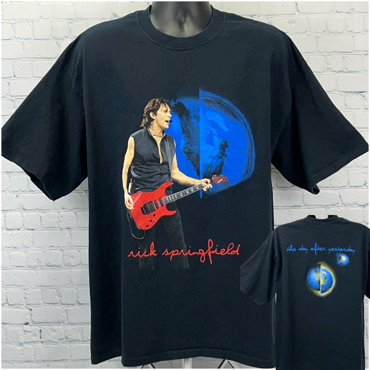Black Rick Springfield T Shirt in size large featuring a colorful graphic of Rick playing guitar on the front