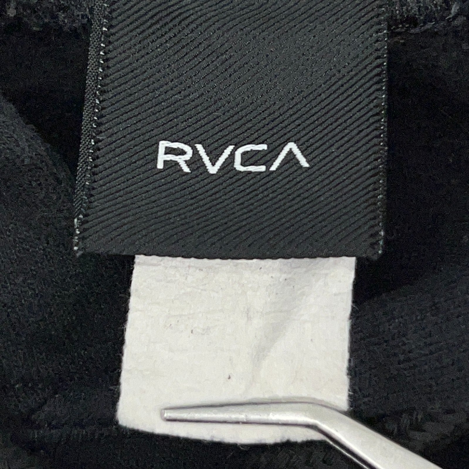 RVCA hoodie in black, size medium, front view featuring soft fabric and comfy hooded sweatshirt style