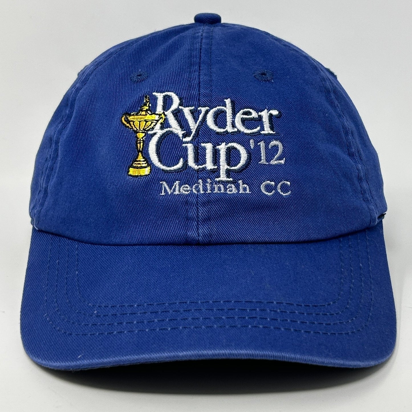Blue AHEAD Golf Hat featuring embroidered Ryder Cup 2012 logo for stylish golf enthusiasts