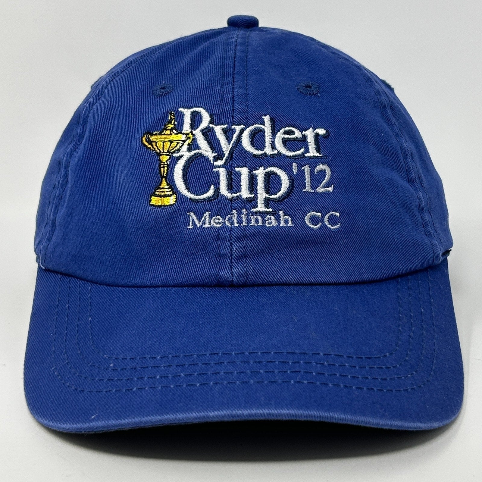 Blue AHEAD Golf Hat featuring embroidered Ryder Cup 2012 logo for stylish golf enthusiasts