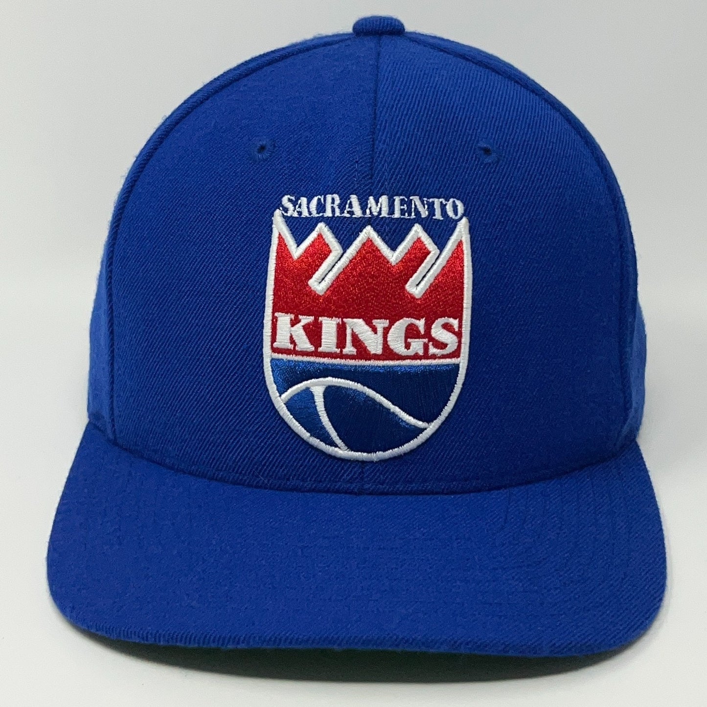 Front view of a blue Sacramento Kings Hat featuring the embroidered team logo