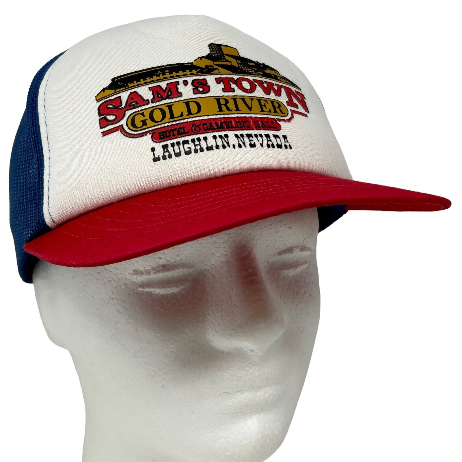 Yupoong Sams Town trucker hat in white, navy, and red with logo from Laughlin, Nevada