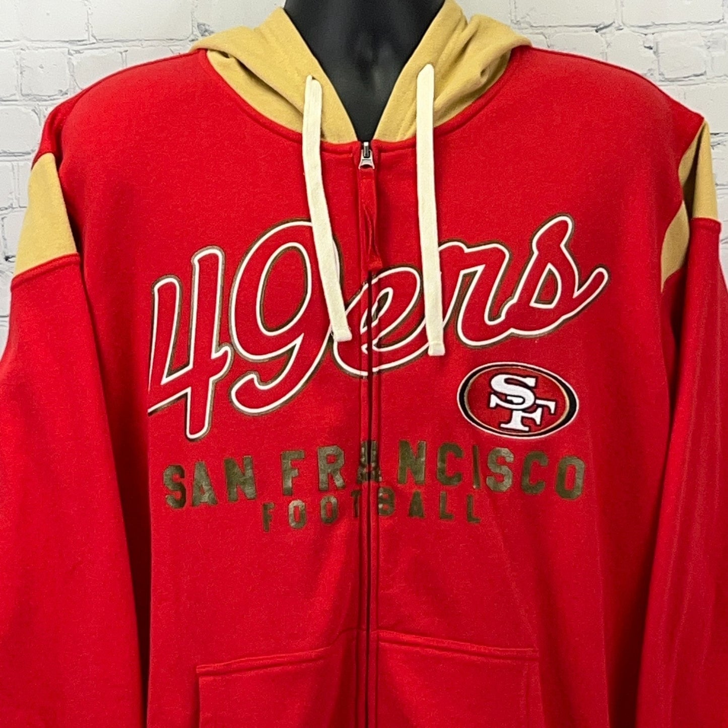 Red San Francisco 49ers zip-up hoodie with gold accents and front logo for fans