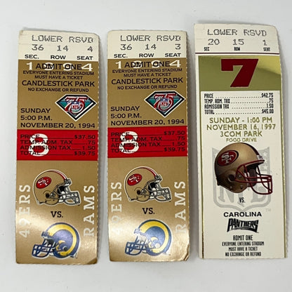 San Francisco 49ers game tickets in gold featuring logos and details from 1994 and 1997 matchups