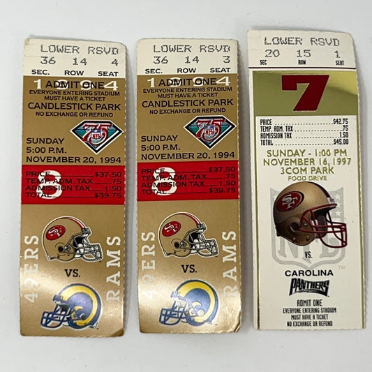 San Francisco 49ers game tickets in gold featuring logos and details from 1994 and 1997 matchups