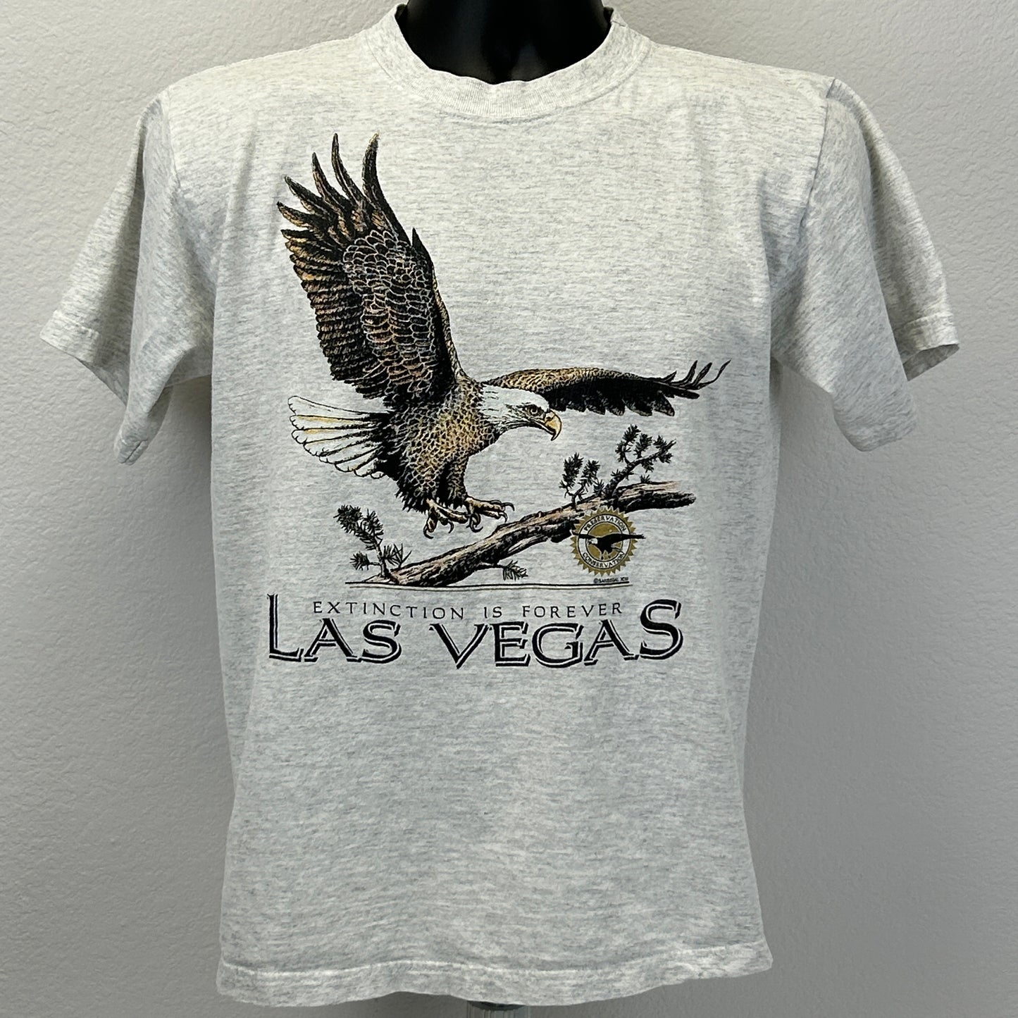 Sansegal Sportswear 90s grey T-shirt featuring a bald eagle graphic and Las Vegas lettering on the front